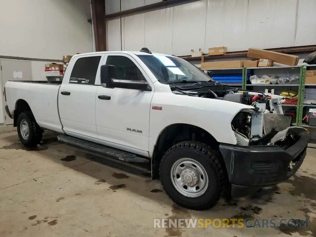 4 Photograph of a damaged car 3C6UR5HJ3NG365610 RAM 2500 2022
