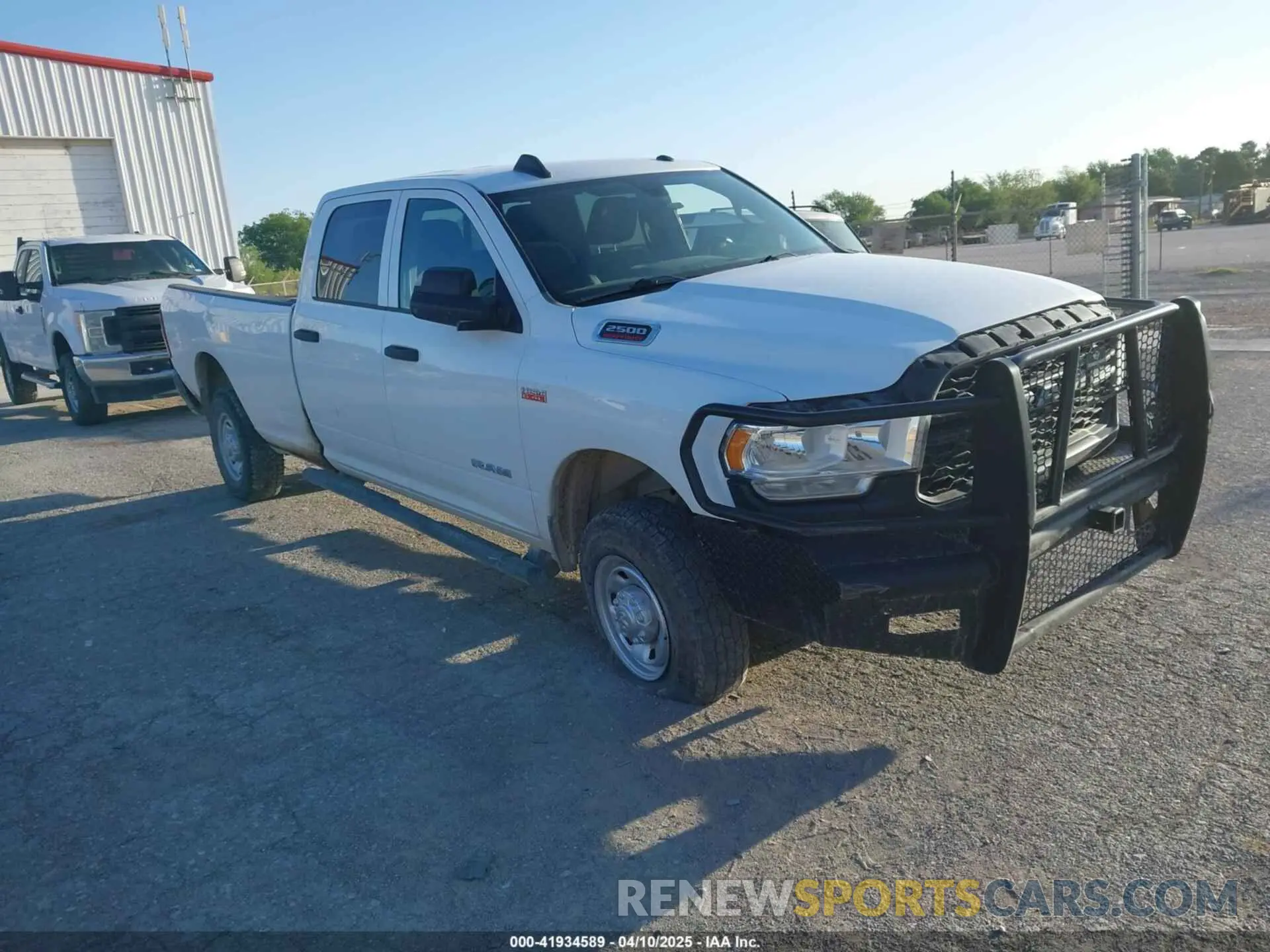 1 Photograph of a damaged car 3C6UR5HJ4NG130956 RAM 2500 2022
