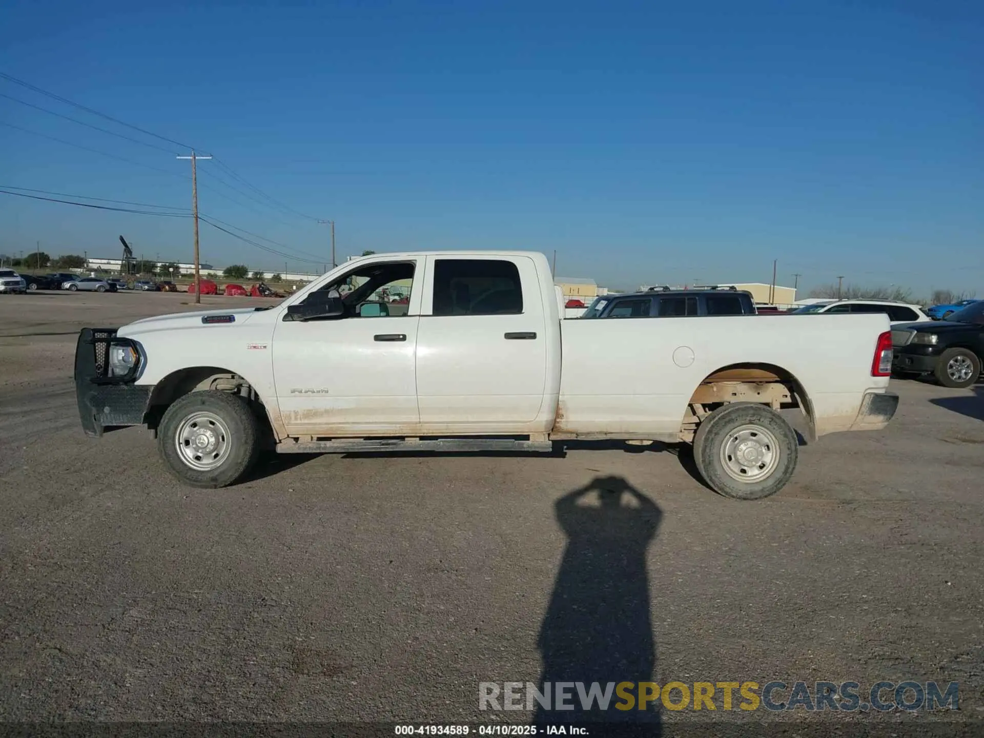 14 Photograph of a damaged car 3C6UR5HJ4NG130956 RAM 2500 2022