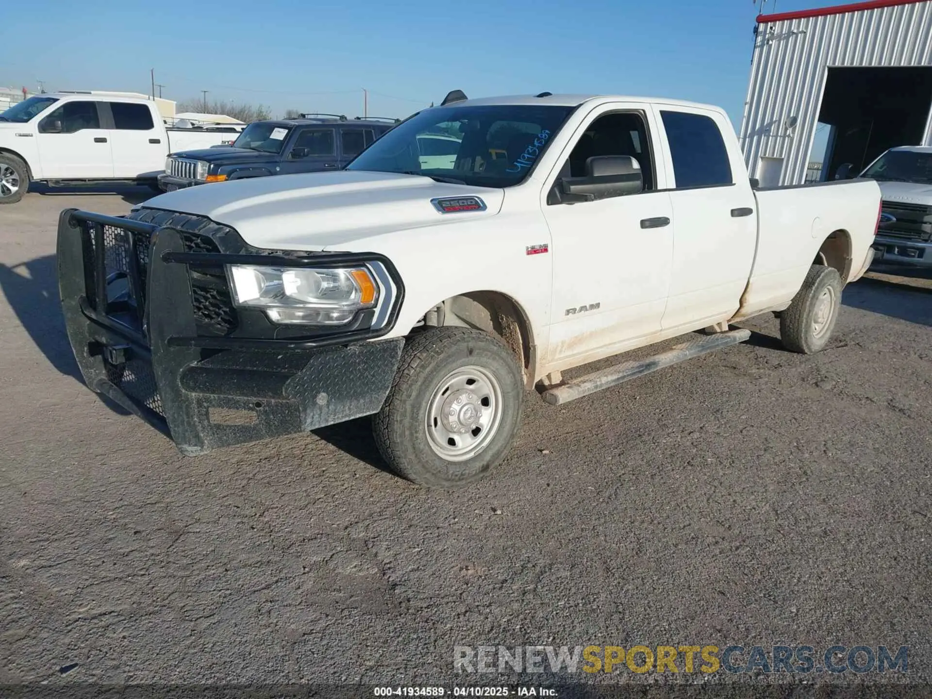 2 Photograph of a damaged car 3C6UR5HJ4NG130956 RAM 2500 2022