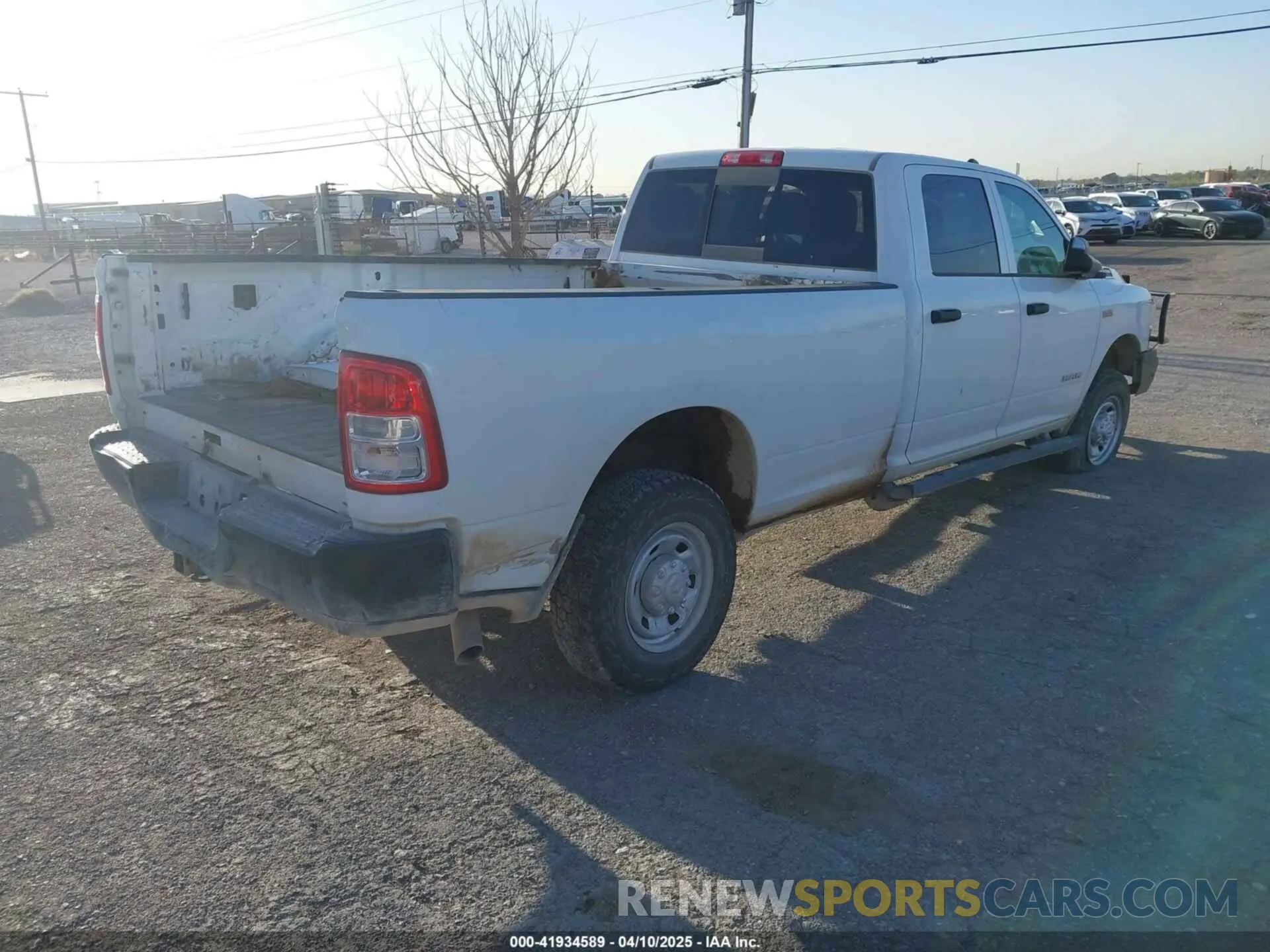 4 Photograph of a damaged car 3C6UR5HJ4NG130956 RAM 2500 2022