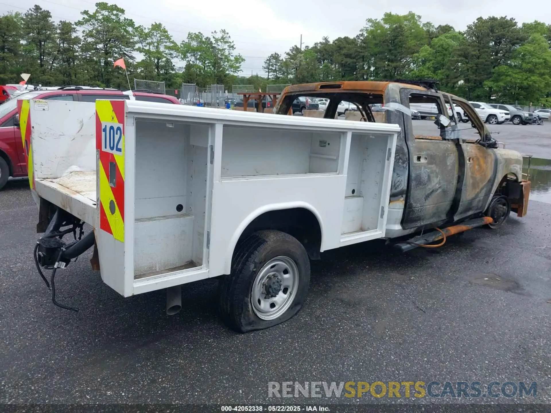 4 Photograph of a damaged car 3C6UR5HJ4NG232449 RAM 2500 2022