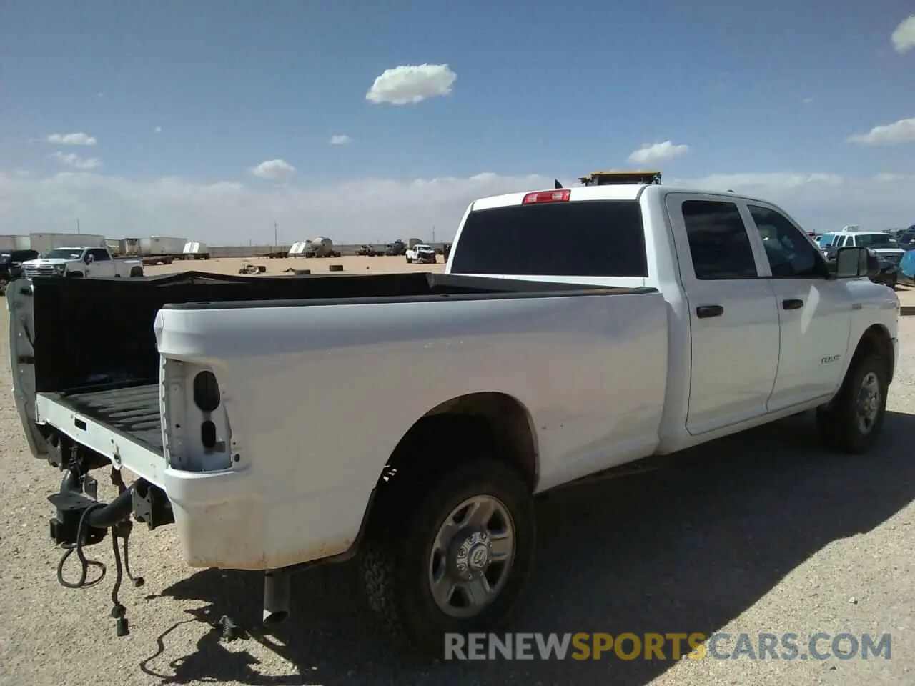 3 Photograph of a damaged car 3C6UR5HJ5NG149788 RAM 2500 2022