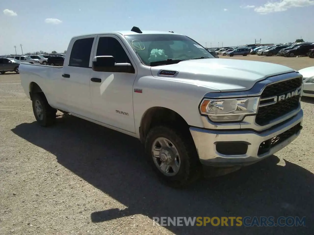 4 Photograph of a damaged car 3C6UR5HJ5NG149788 RAM 2500 2022