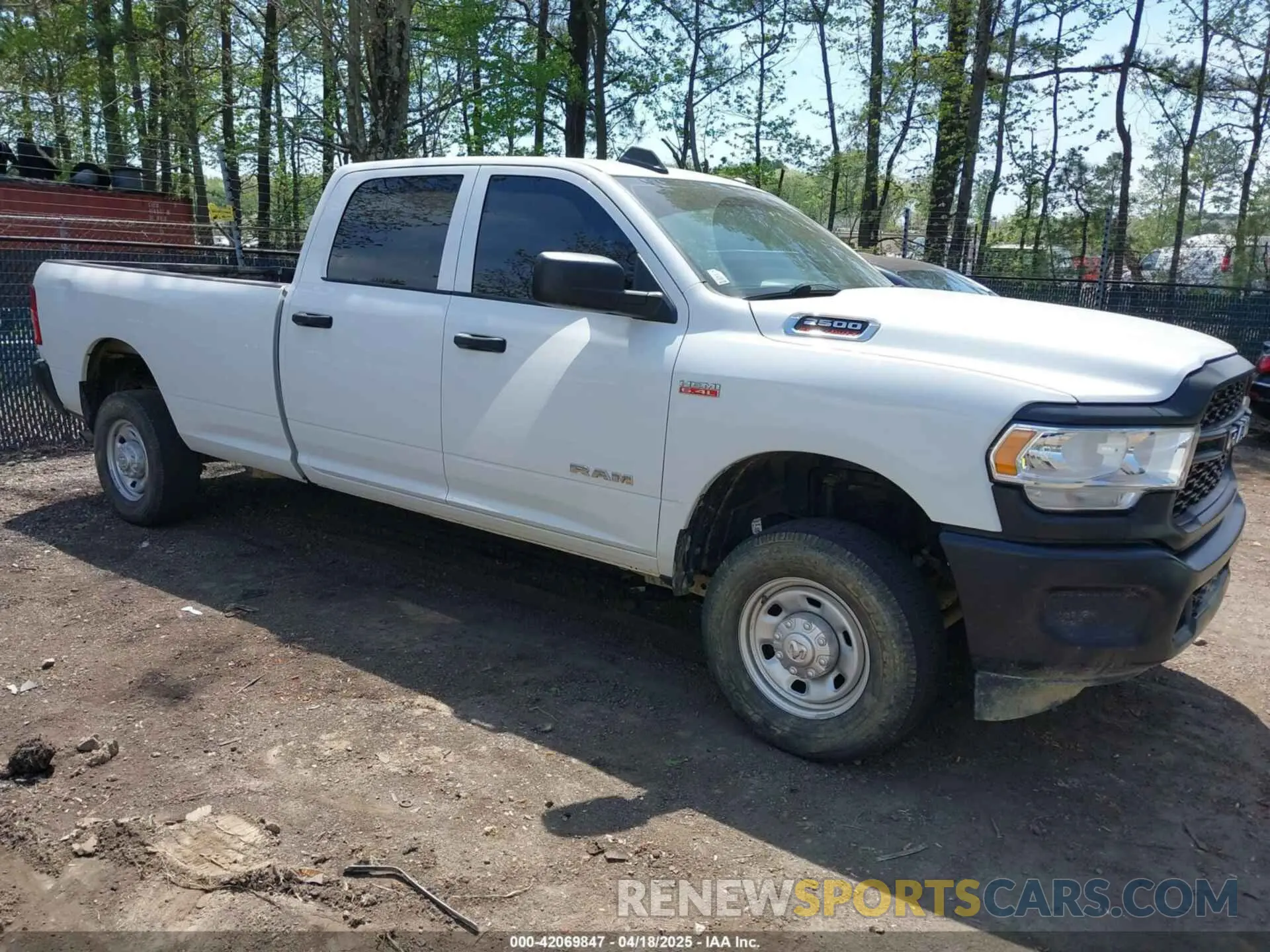 1 Photograph of a damaged car 3C6UR5HJ5NG202232 RAM 2500 2022