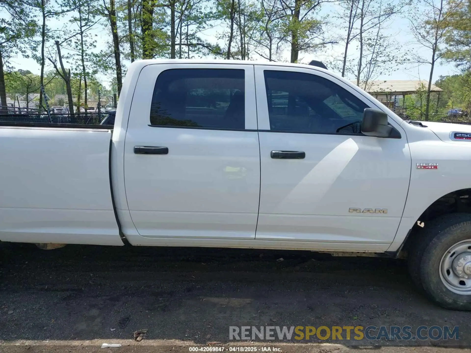 13 Photograph of a damaged car 3C6UR5HJ5NG202232 RAM 2500 2022