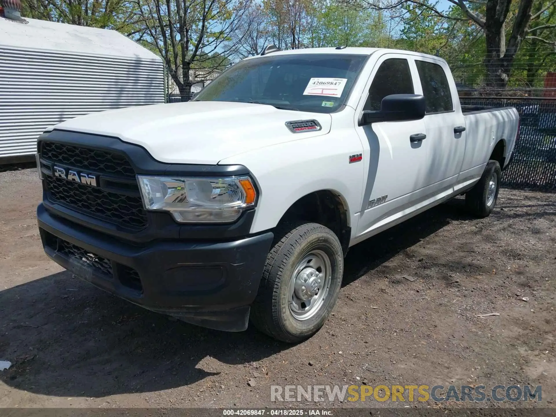 2 Photograph of a damaged car 3C6UR5HJ5NG202232 RAM 2500 2022