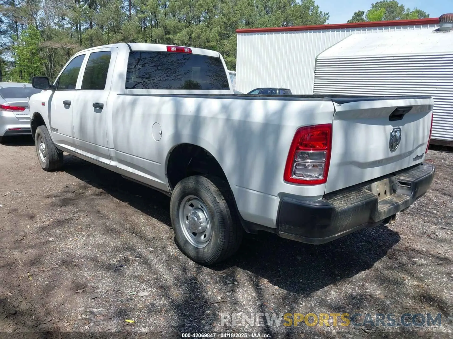 3 Photograph of a damaged car 3C6UR5HJ5NG202232 RAM 2500 2022