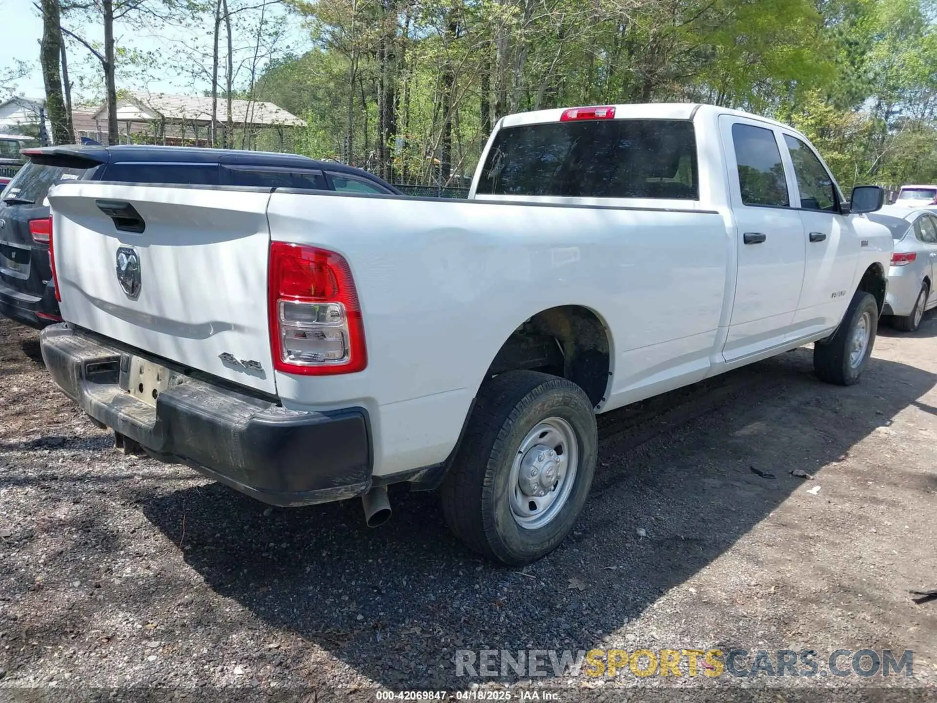 4 Photograph of a damaged car 3C6UR5HJ5NG202232 RAM 2500 2022
