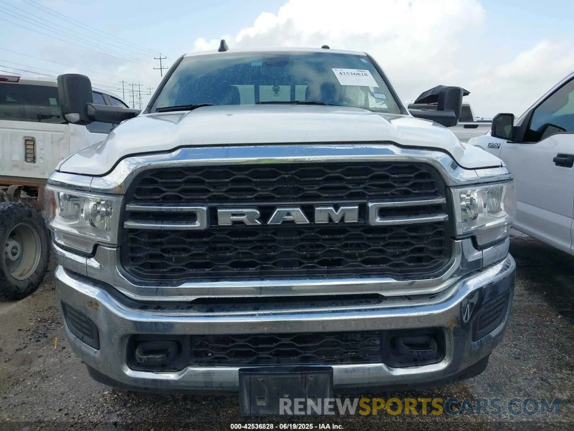 12 Photograph of a damaged car 3C6UR5HJ6NG125807 RAM 2500 2022