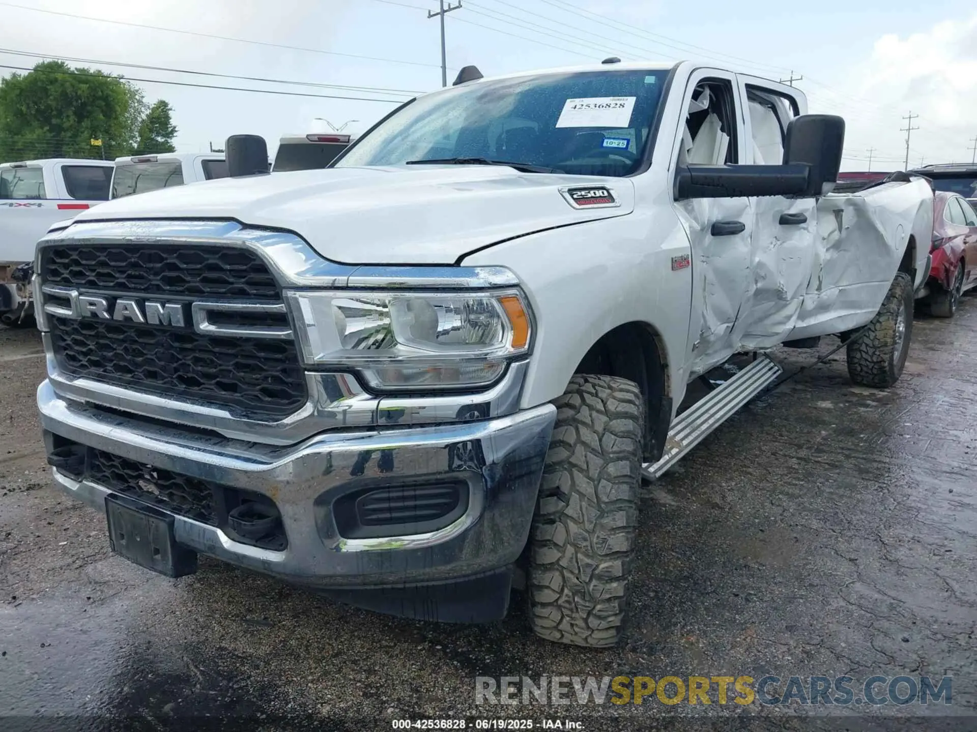 2 Photograph of a damaged car 3C6UR5HJ6NG125807 RAM 2500 2022