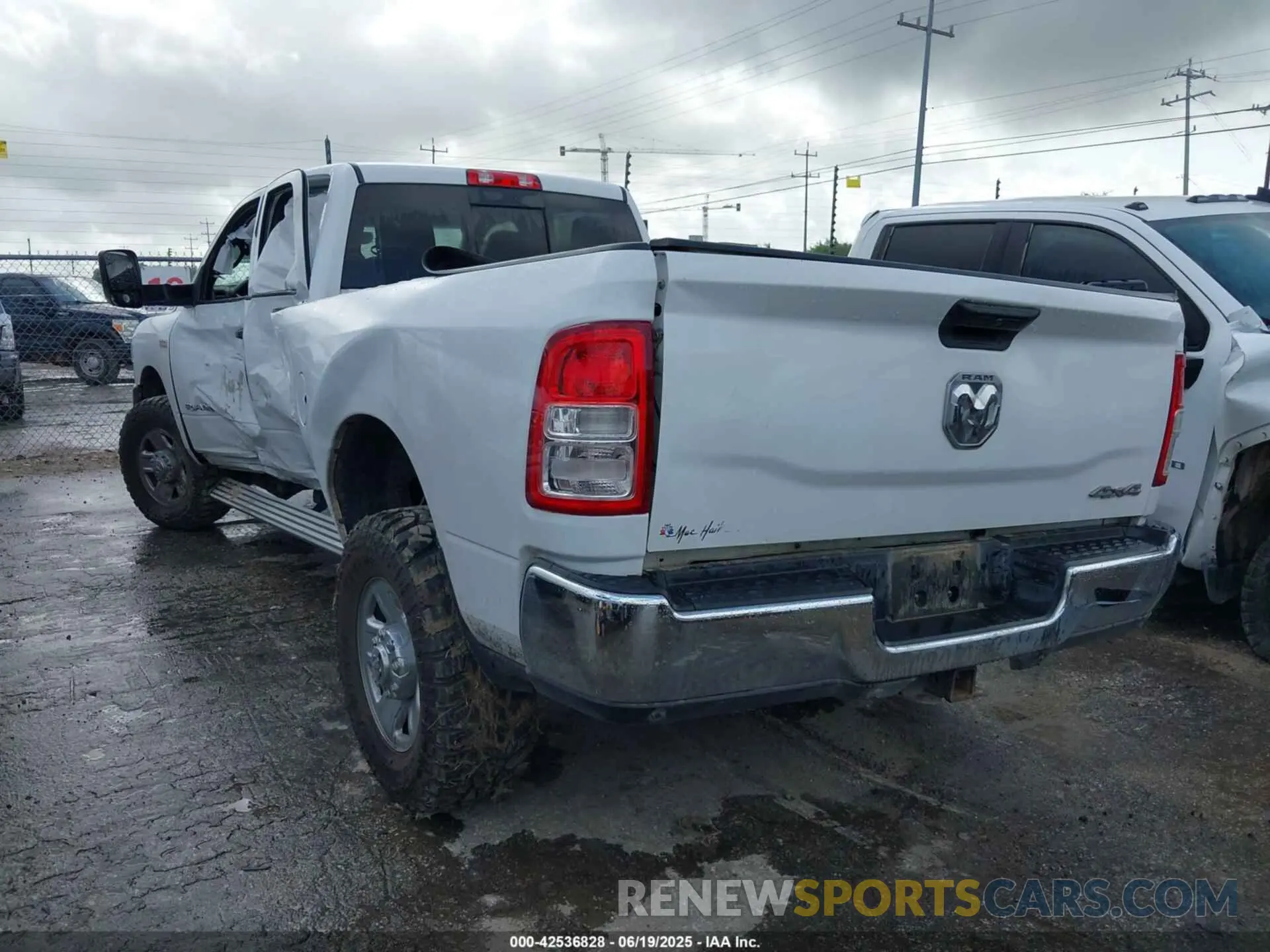 3 Photograph of a damaged car 3C6UR5HJ6NG125807 RAM 2500 2022
