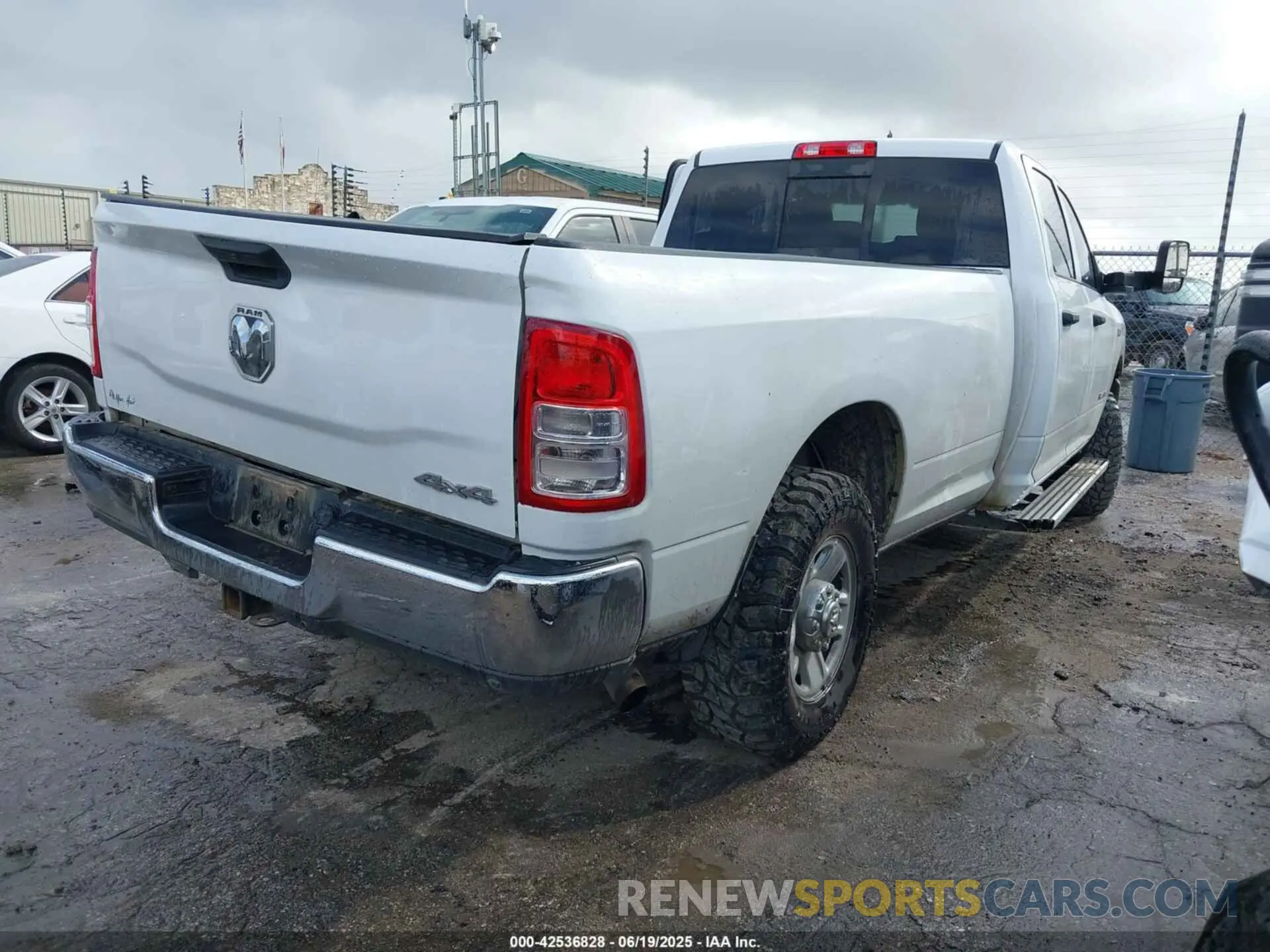 4 Photograph of a damaged car 3C6UR5HJ6NG125807 RAM 2500 2022
