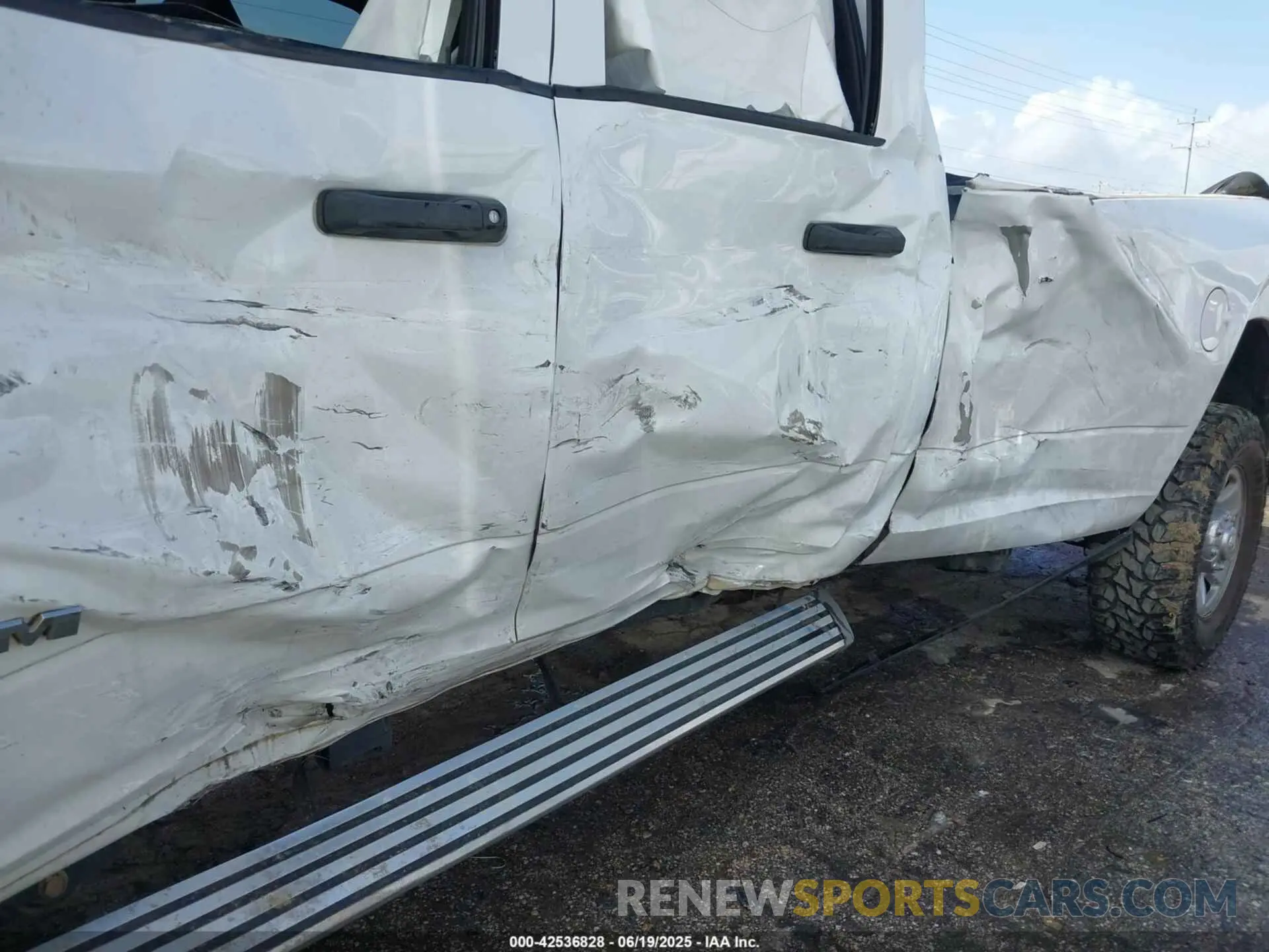 6 Photograph of a damaged car 3C6UR5HJ6NG125807 RAM 2500 2022