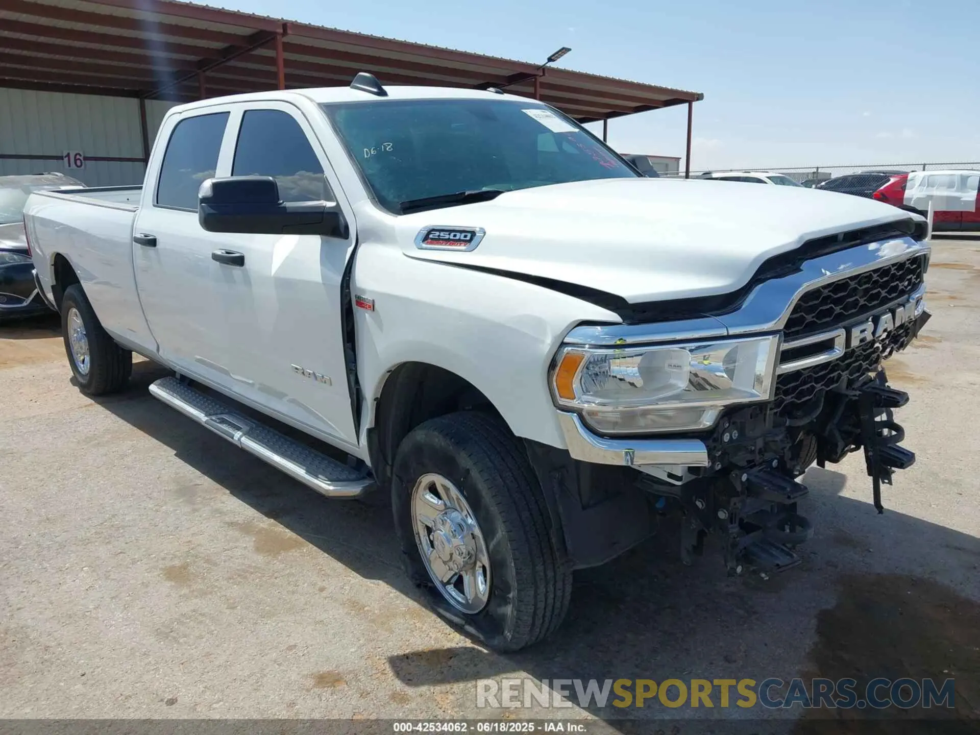 1 Photograph of a damaged car 3C6UR5HJ6NG390520 RAM 2500 2022