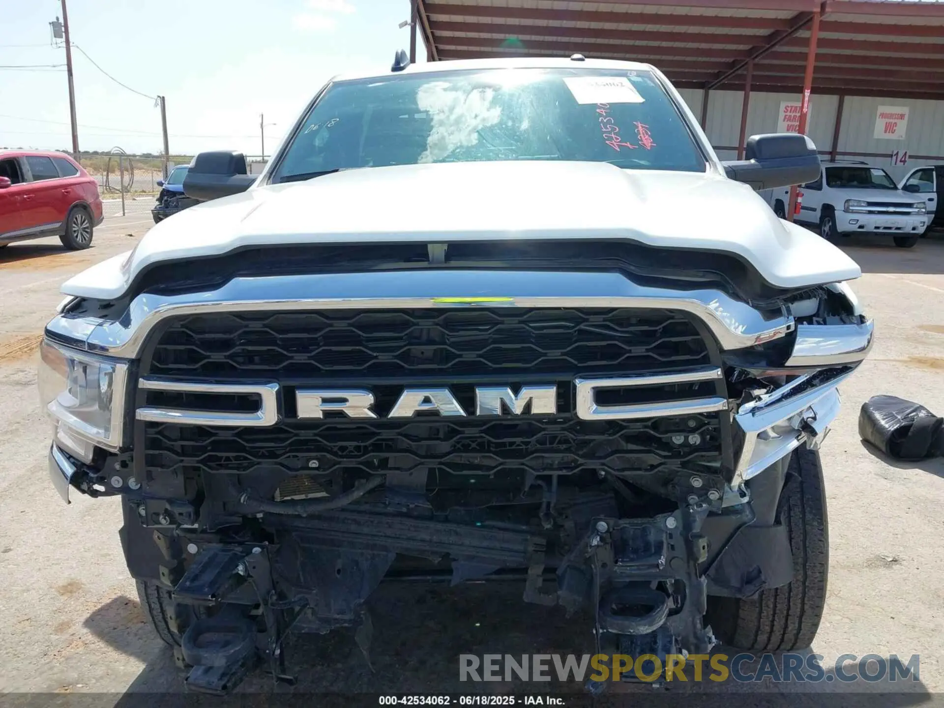 12 Photograph of a damaged car 3C6UR5HJ6NG390520 RAM 2500 2022