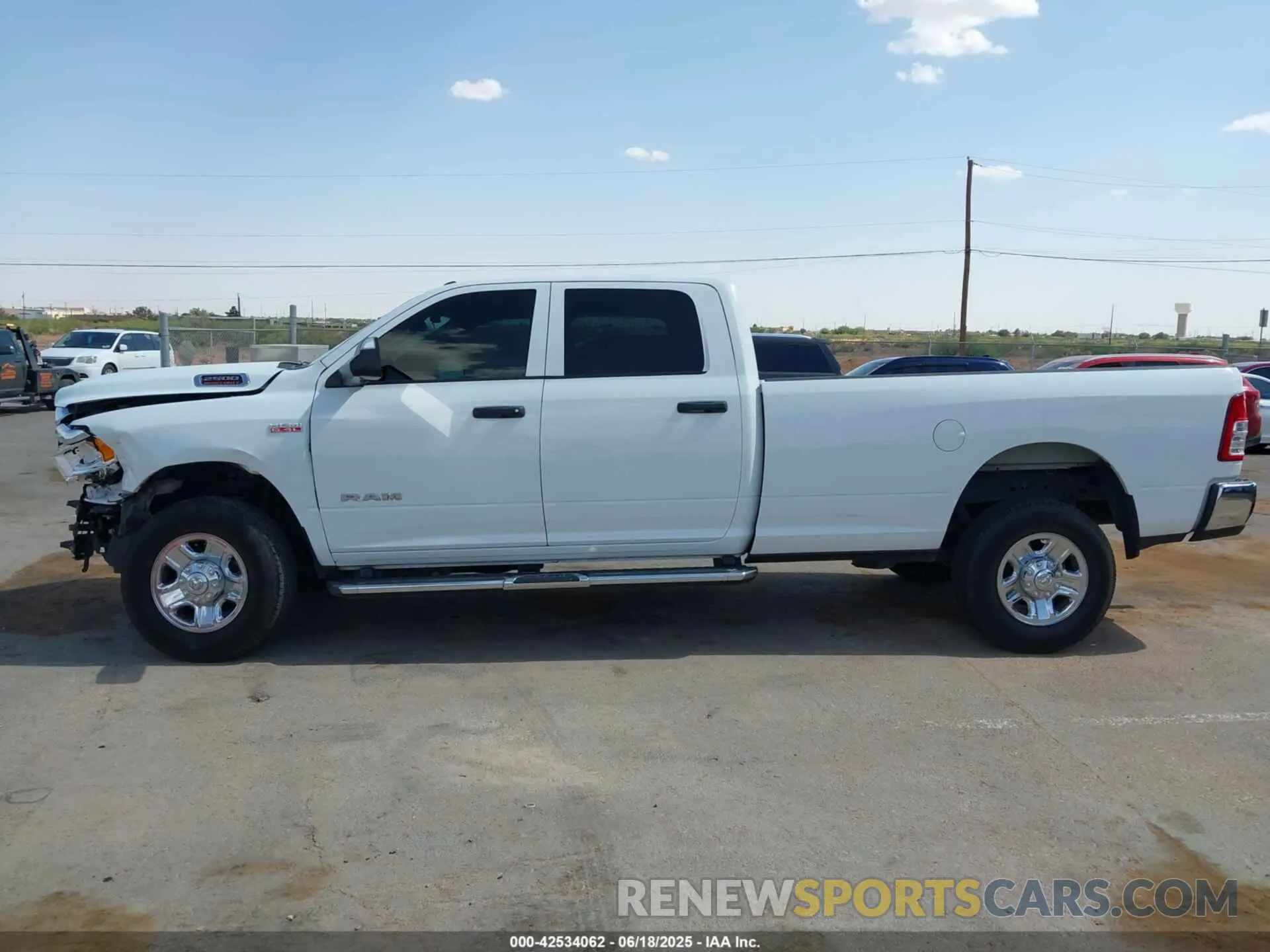 14 Photograph of a damaged car 3C6UR5HJ6NG390520 RAM 2500 2022