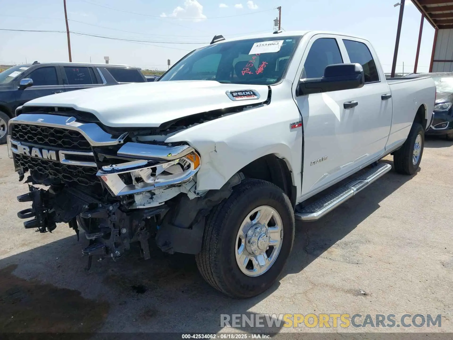 2 Photograph of a damaged car 3C6UR5HJ6NG390520 RAM 2500 2022
