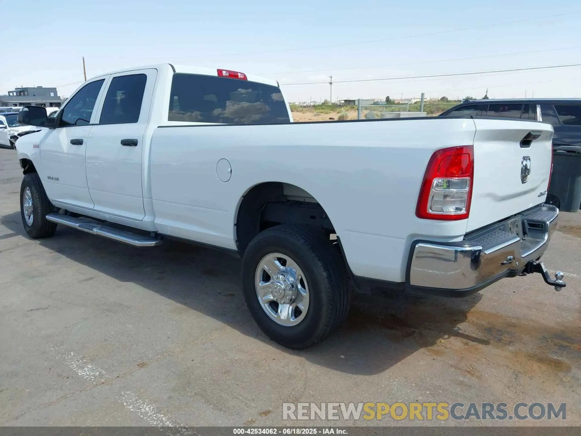 3 Photograph of a damaged car 3C6UR5HJ6NG390520 RAM 2500 2022