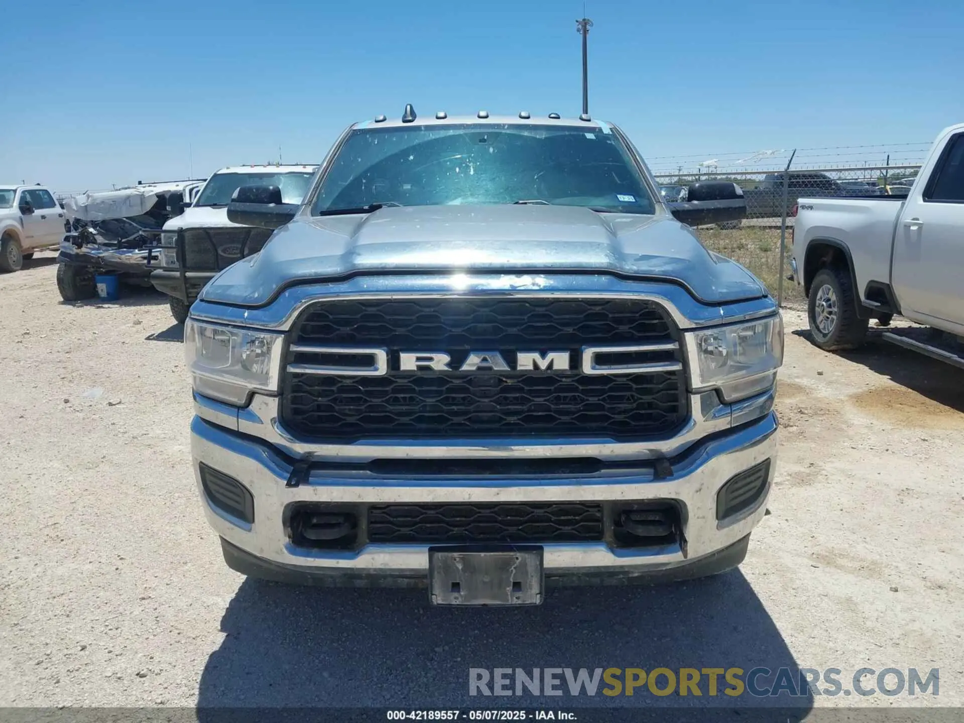 12 Photograph of a damaged car 3C6UR5HJ7NG387674 RAM 2500 2022