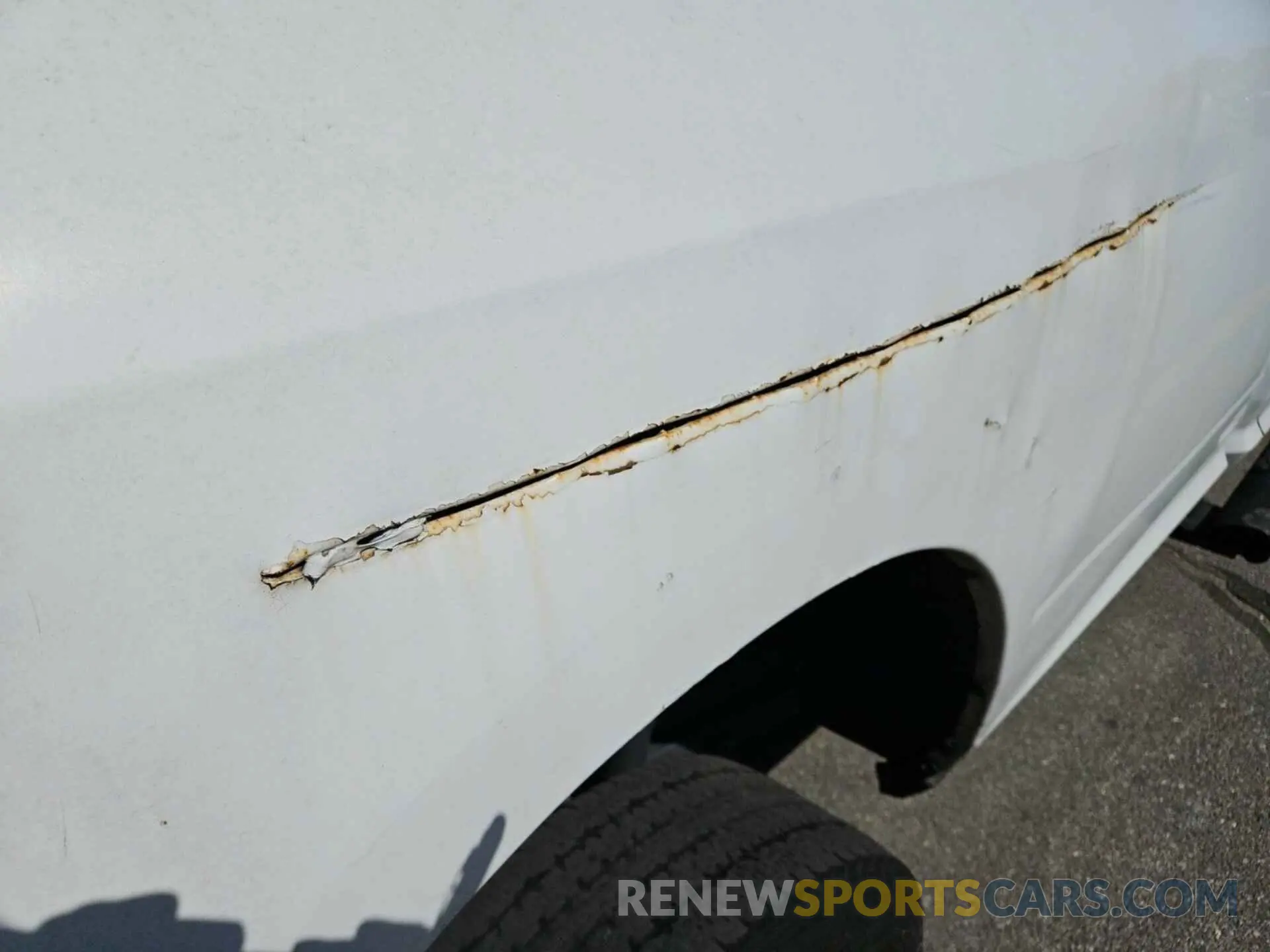 2 Photograph of a damaged car 3C6UR5HJ8NG321800 RAM 2500 2022