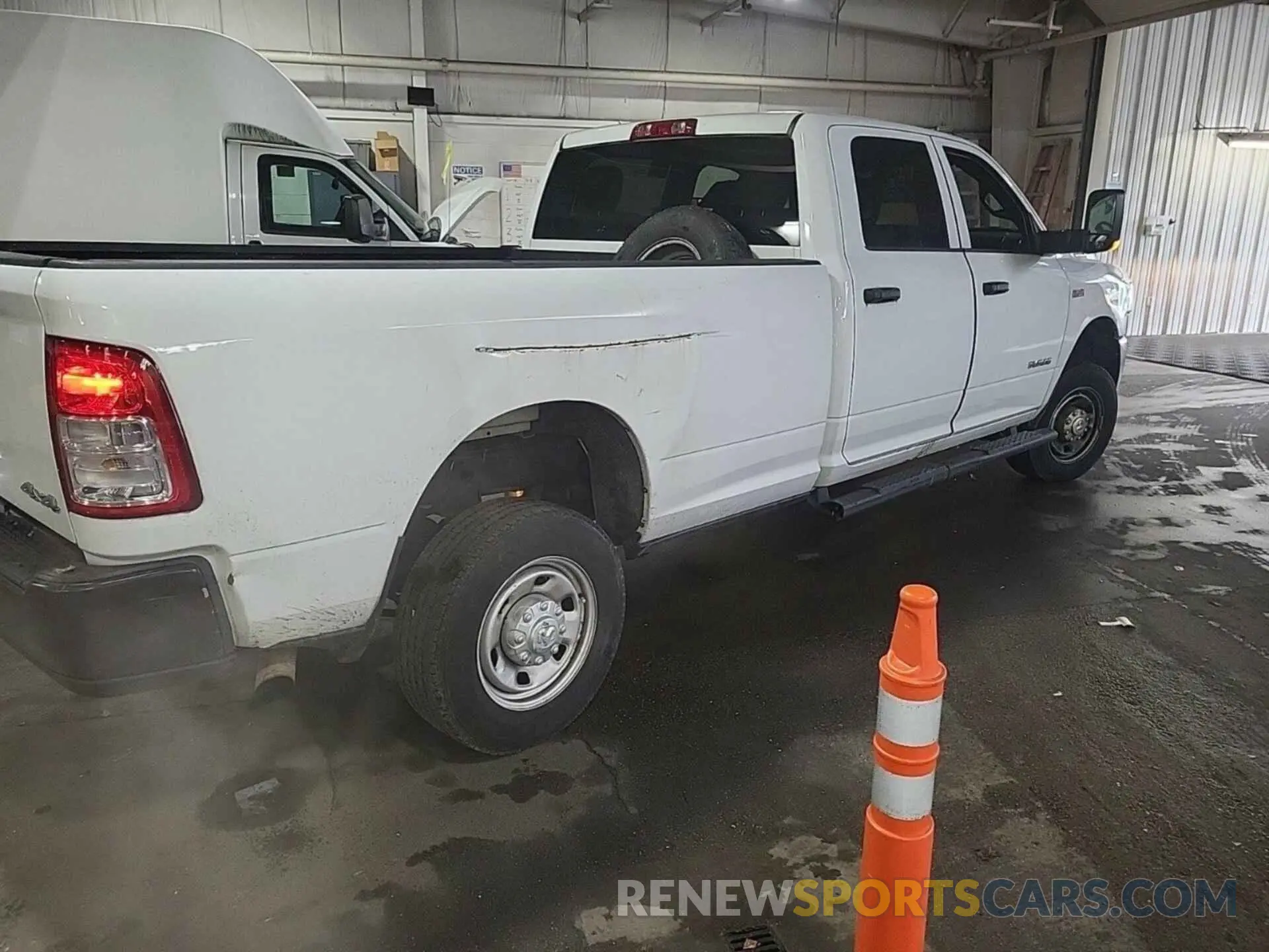 7 Photograph of a damaged car 3C6UR5HJ8NG321800 RAM 2500 2022