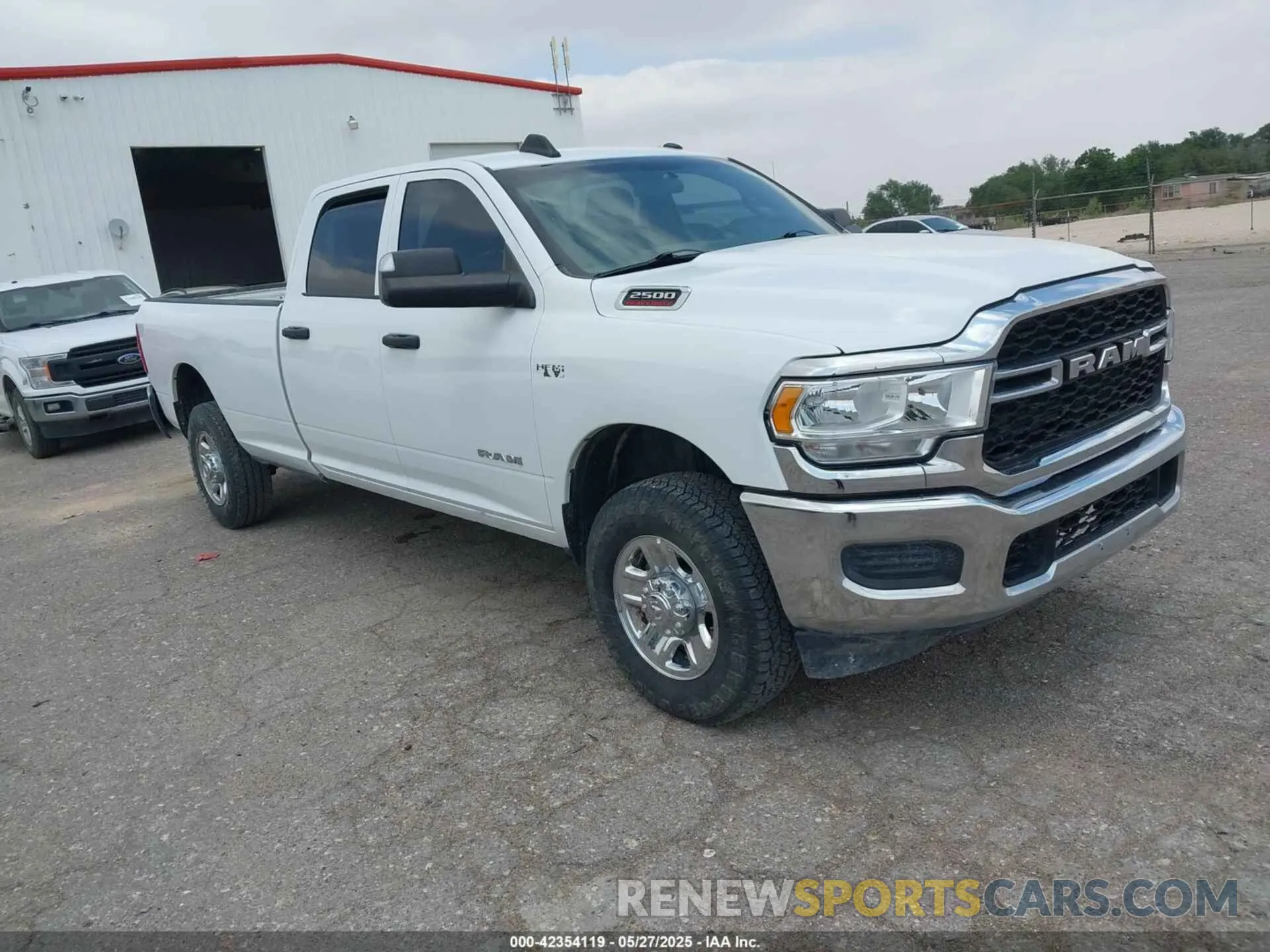 1 Photograph of a damaged car 3C6UR5HJXNG203649 RAM 2500 2022