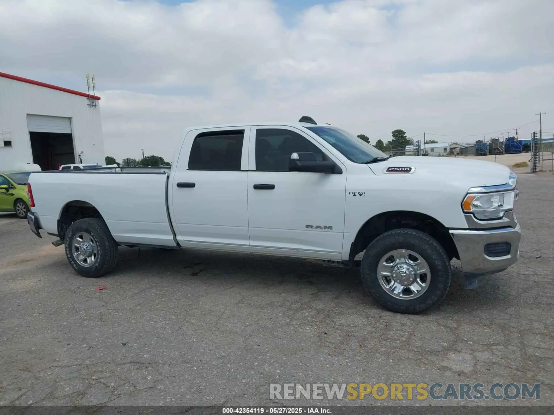 13 Photograph of a damaged car 3C6UR5HJXNG203649 RAM 2500 2022