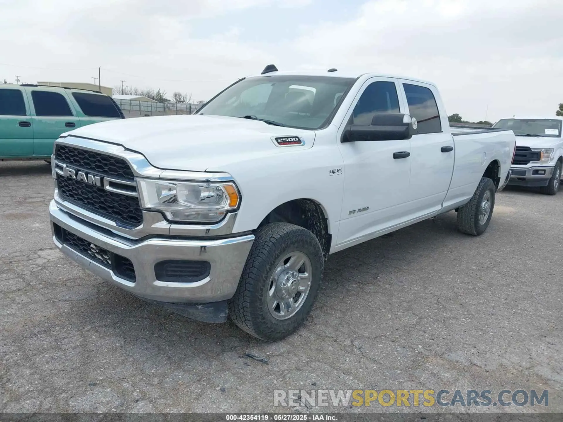 2 Photograph of a damaged car 3C6UR5HJXNG203649 RAM 2500 2022