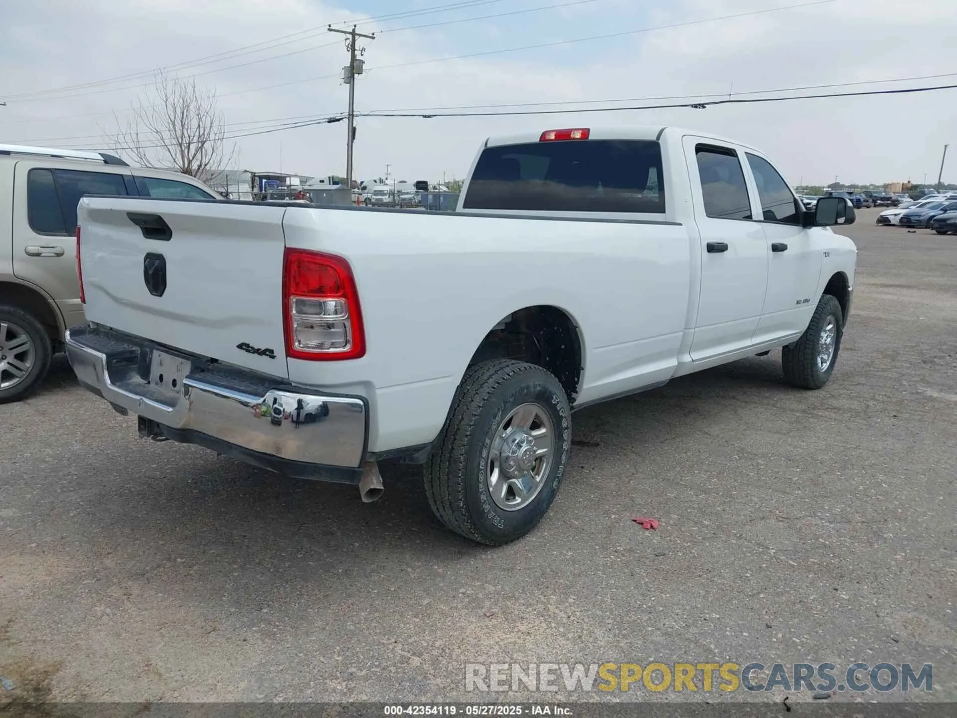 4 Photograph of a damaged car 3C6UR5HJXNG203649 RAM 2500 2022