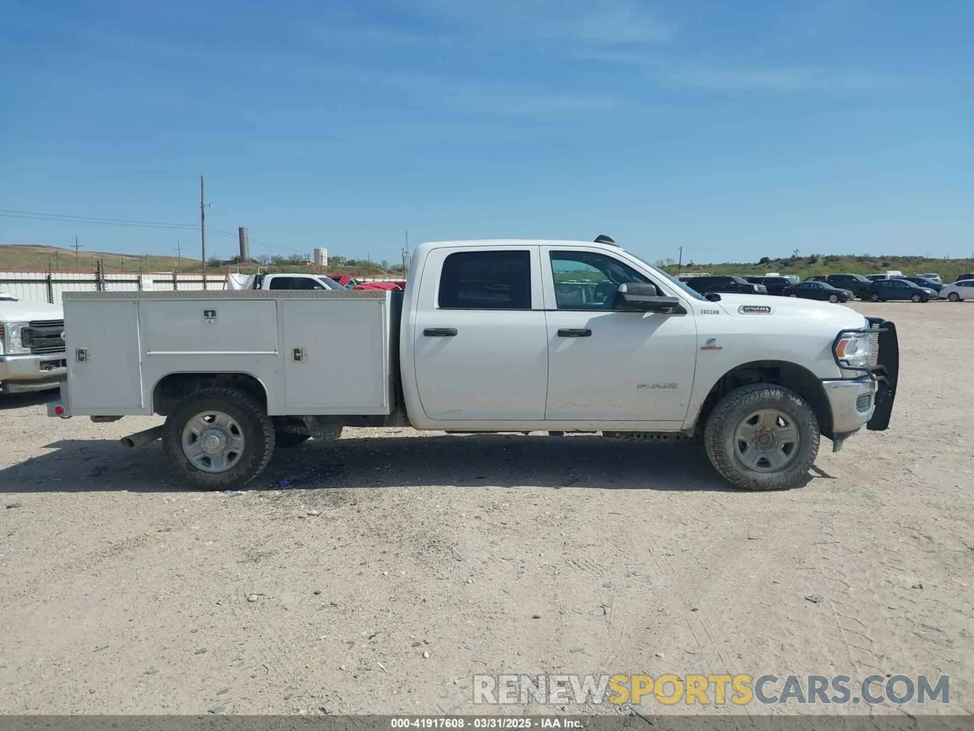 13 Photograph of a damaged car 3C6UR5HL1NG213746 RAM 2500 2022