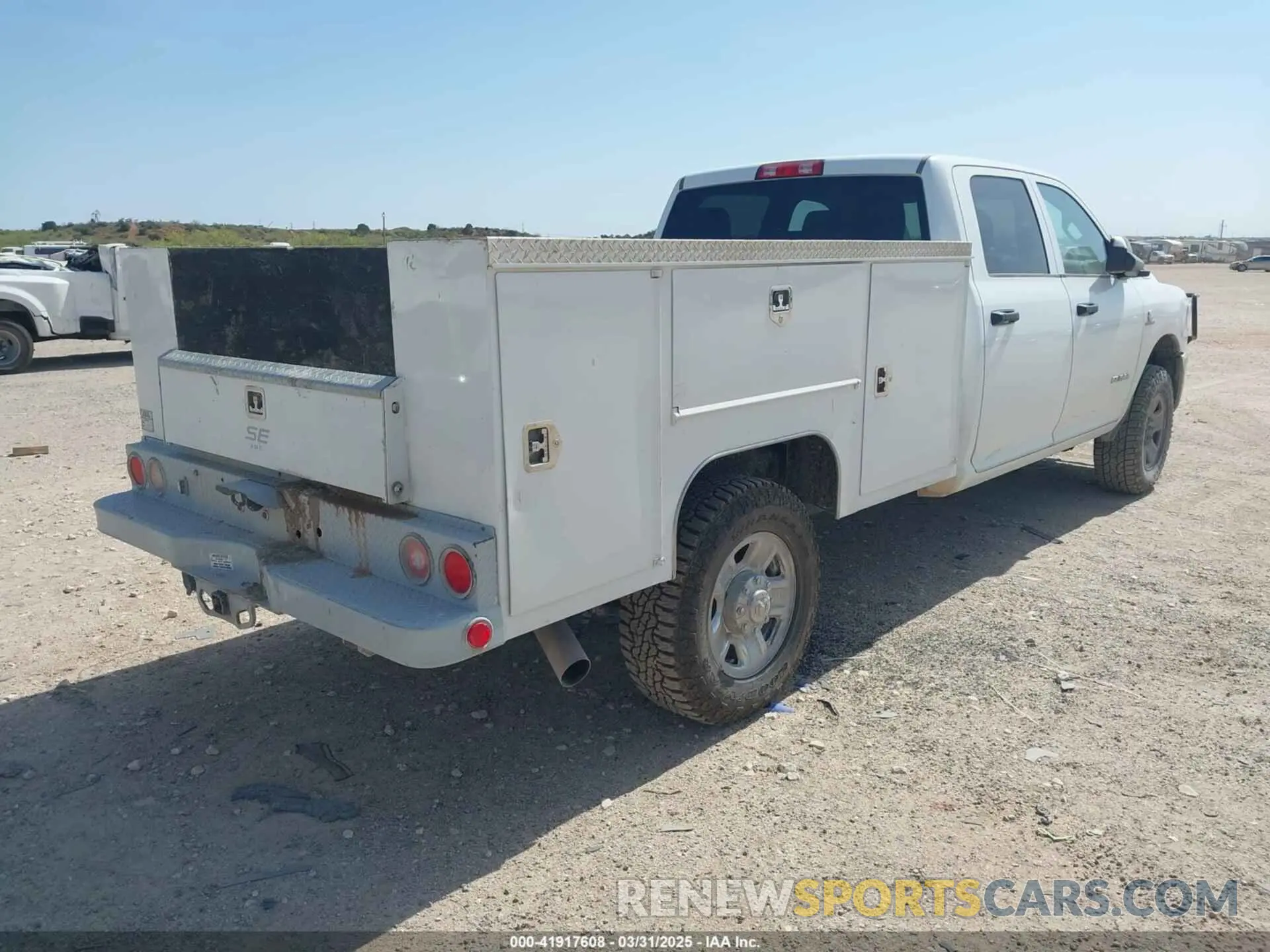 4 Photograph of a damaged car 3C6UR5HL1NG213746 RAM 2500 2022