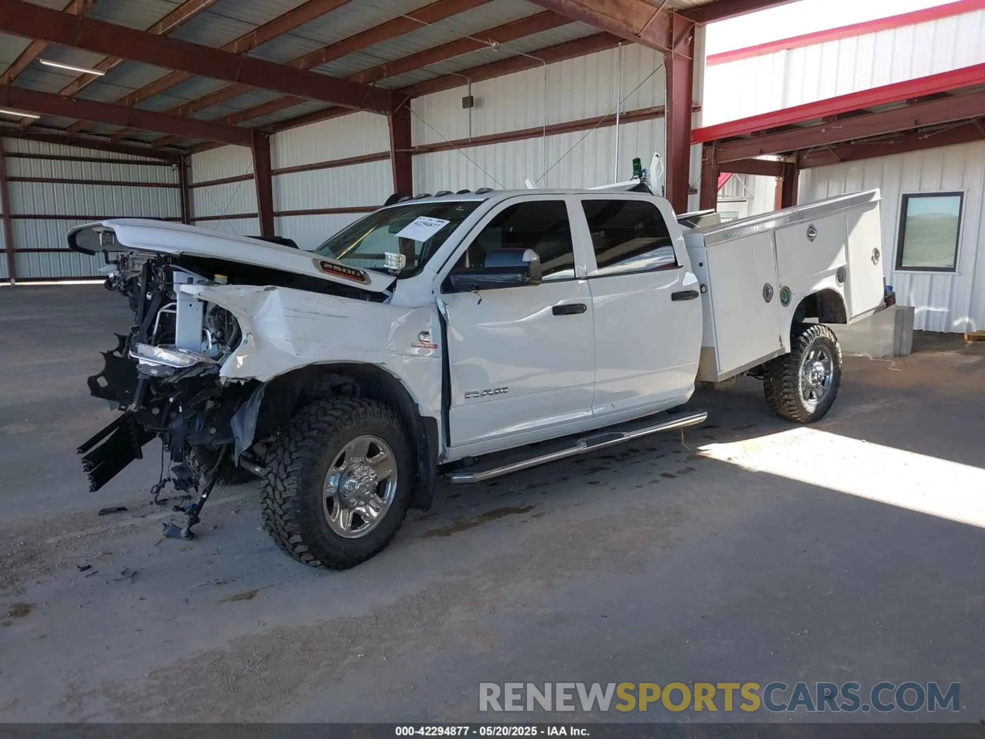 2 Photograph of a damaged car 3C6UR5HL6NG346244 RAM 2500 2022