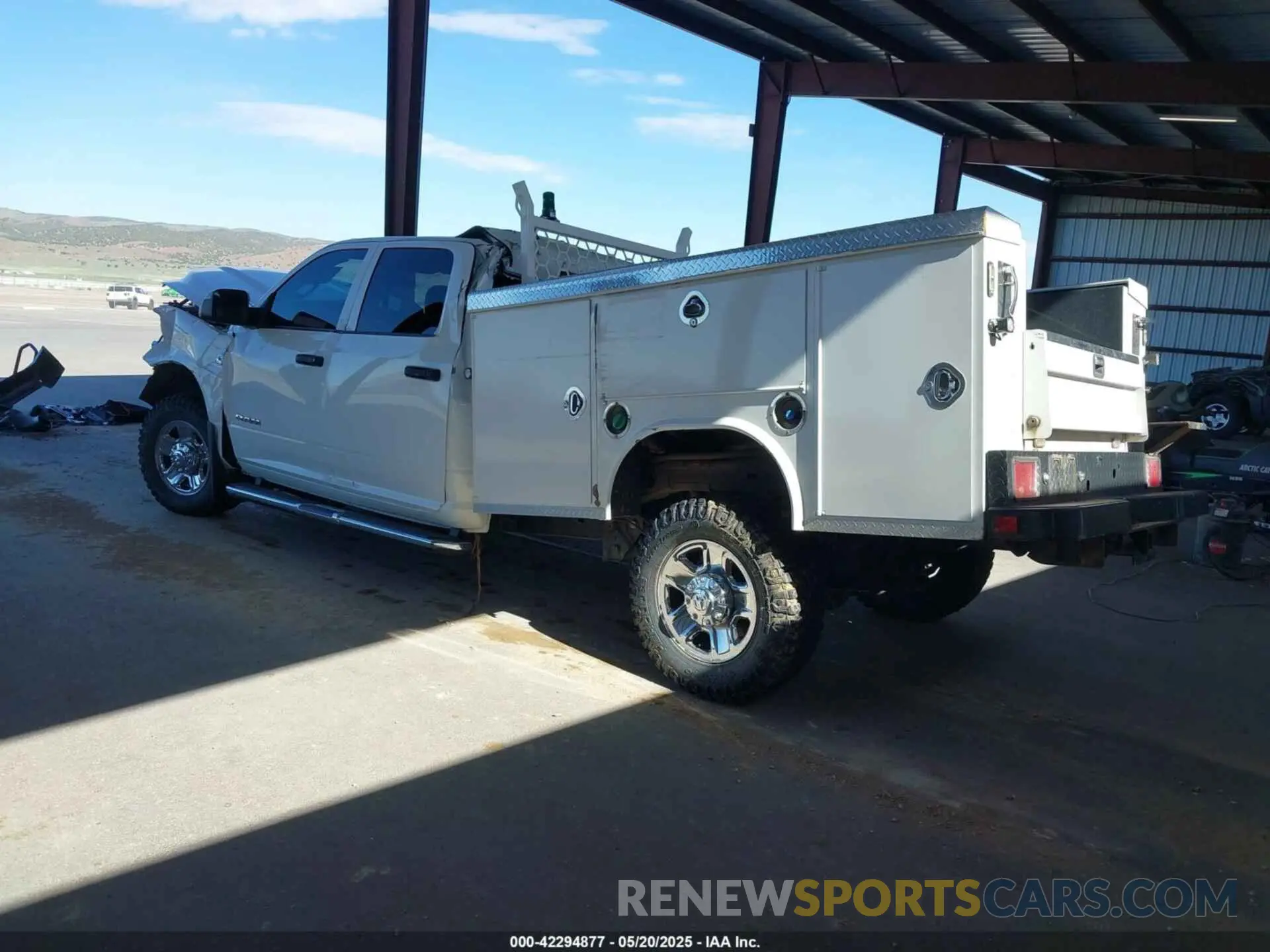 3 Photograph of a damaged car 3C6UR5HL6NG346244 RAM 2500 2022