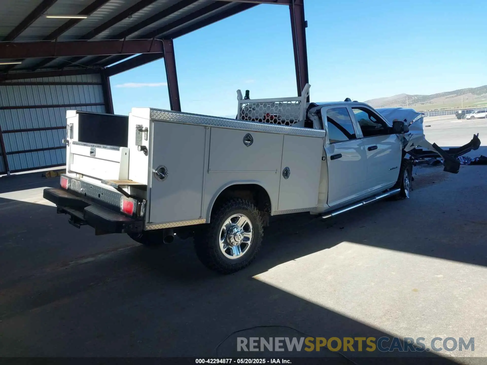 4 Photograph of a damaged car 3C6UR5HL6NG346244 RAM 2500 2022