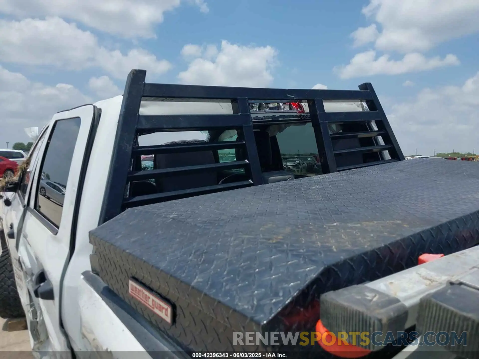 13 Photograph of a damaged car 3C6UR5HL8NG177506 RAM 2500 2022