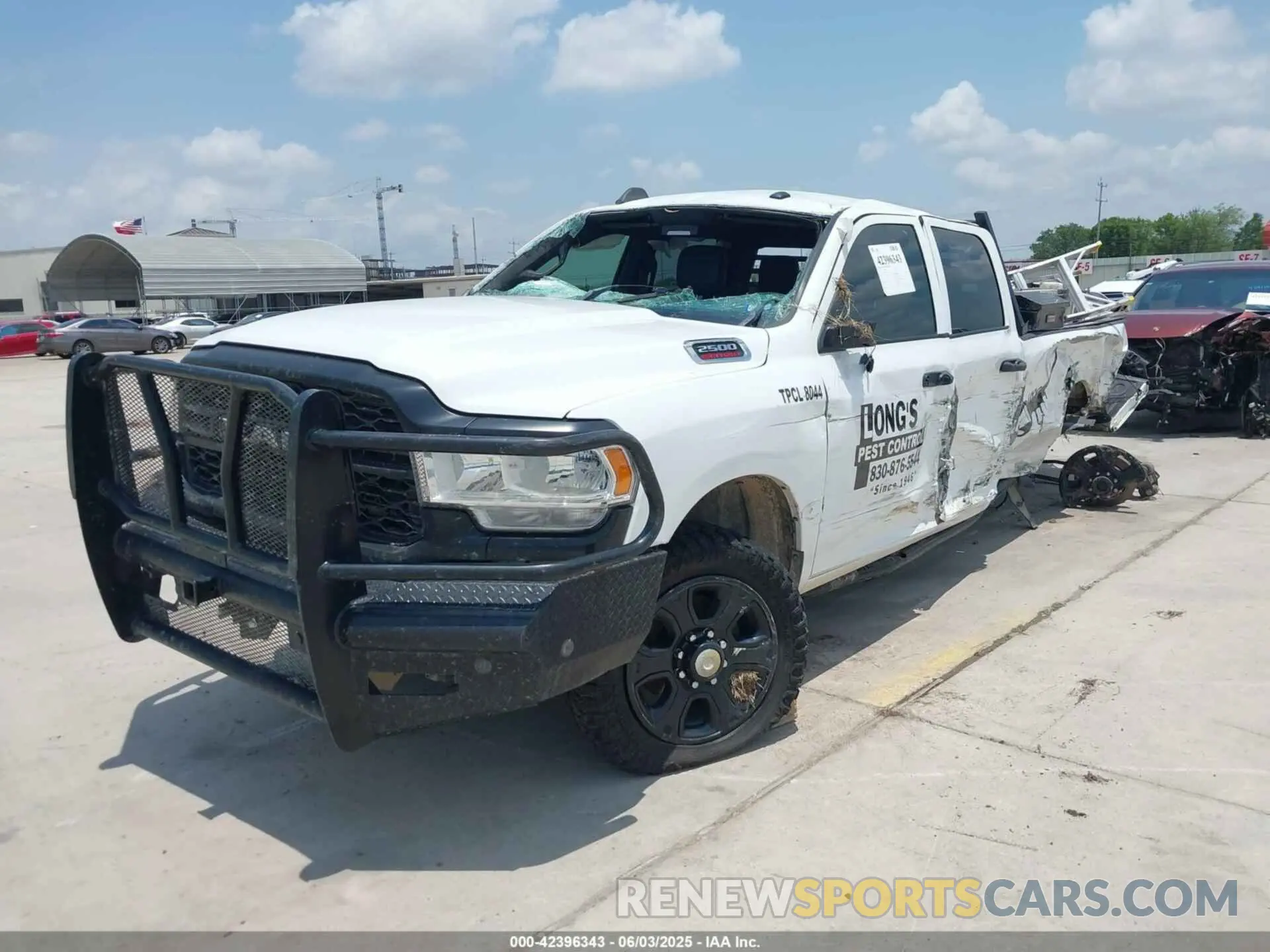 2 Photograph of a damaged car 3C6UR5HL8NG177506 RAM 2500 2022
