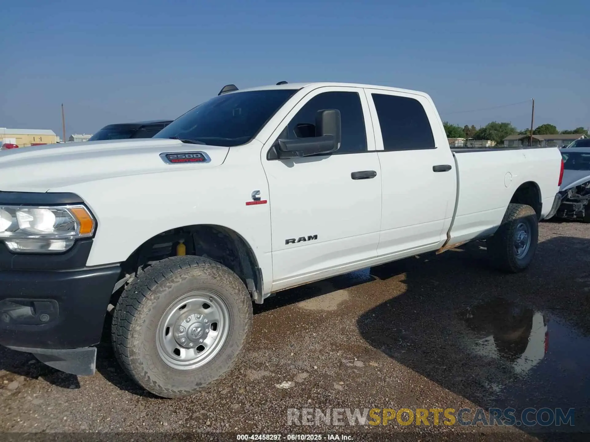 14 Photograph of a damaged car 3C6UR5HL8NG202498 RAM 2500 2022