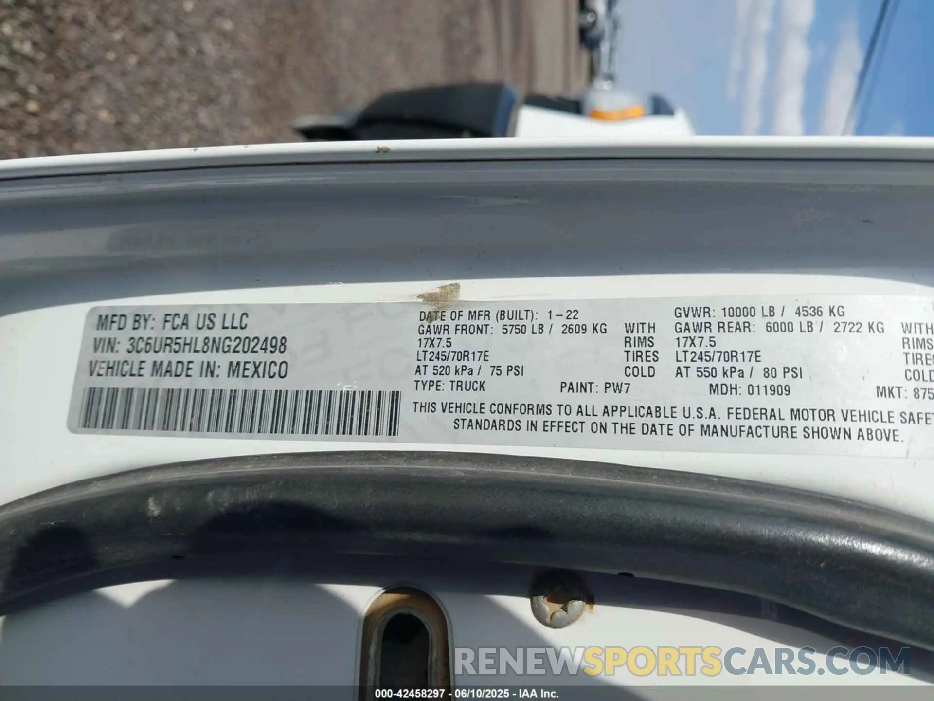 9 Photograph of a damaged car 3C6UR5HL8NG202498 RAM 2500 2022