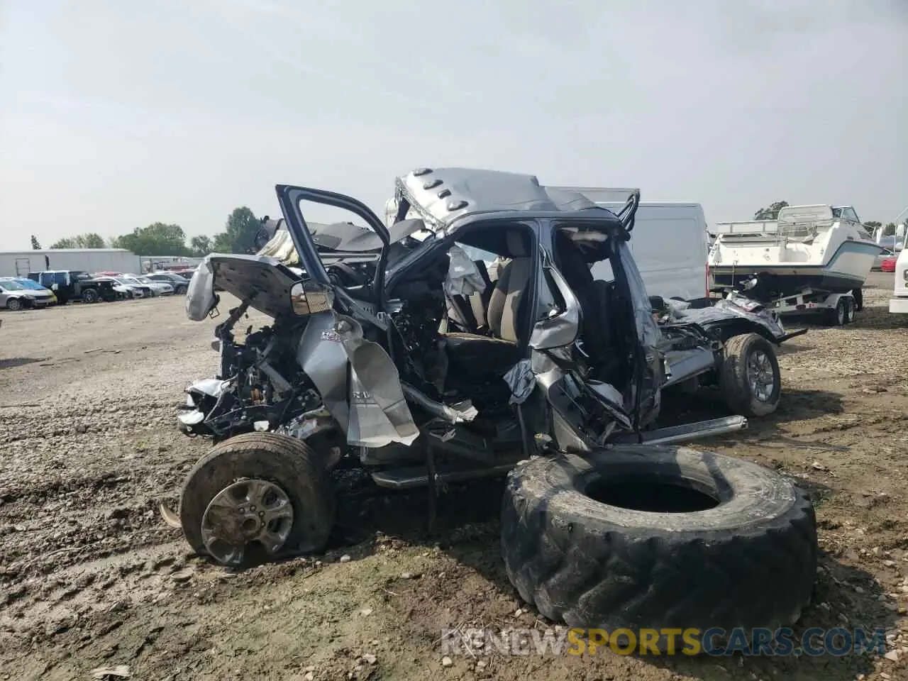 1 Photograph of a damaged car 3C6UR5JJ9NG305146 RAM 2500 2022