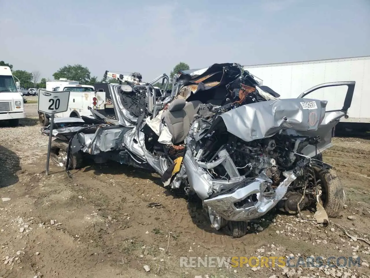 4 Photograph of a damaged car 3C6UR5JJ9NG305146 RAM 2500 2022