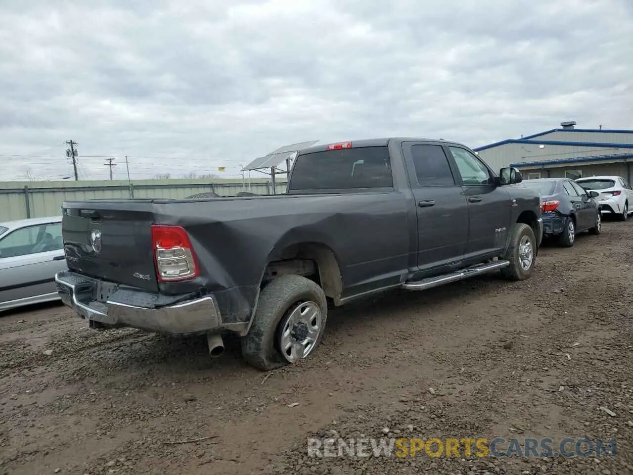 3 Photograph of a damaged car 3C6UR5JL0NG239202 RAM 2500 2022