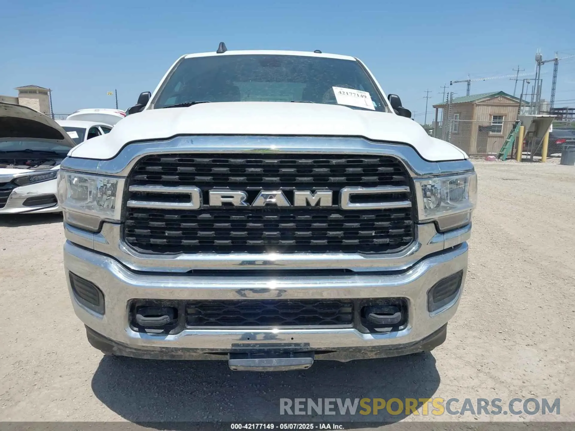 12 Photograph of a damaged car 3C6UR5JL1NG104343 RAM 2500 2022