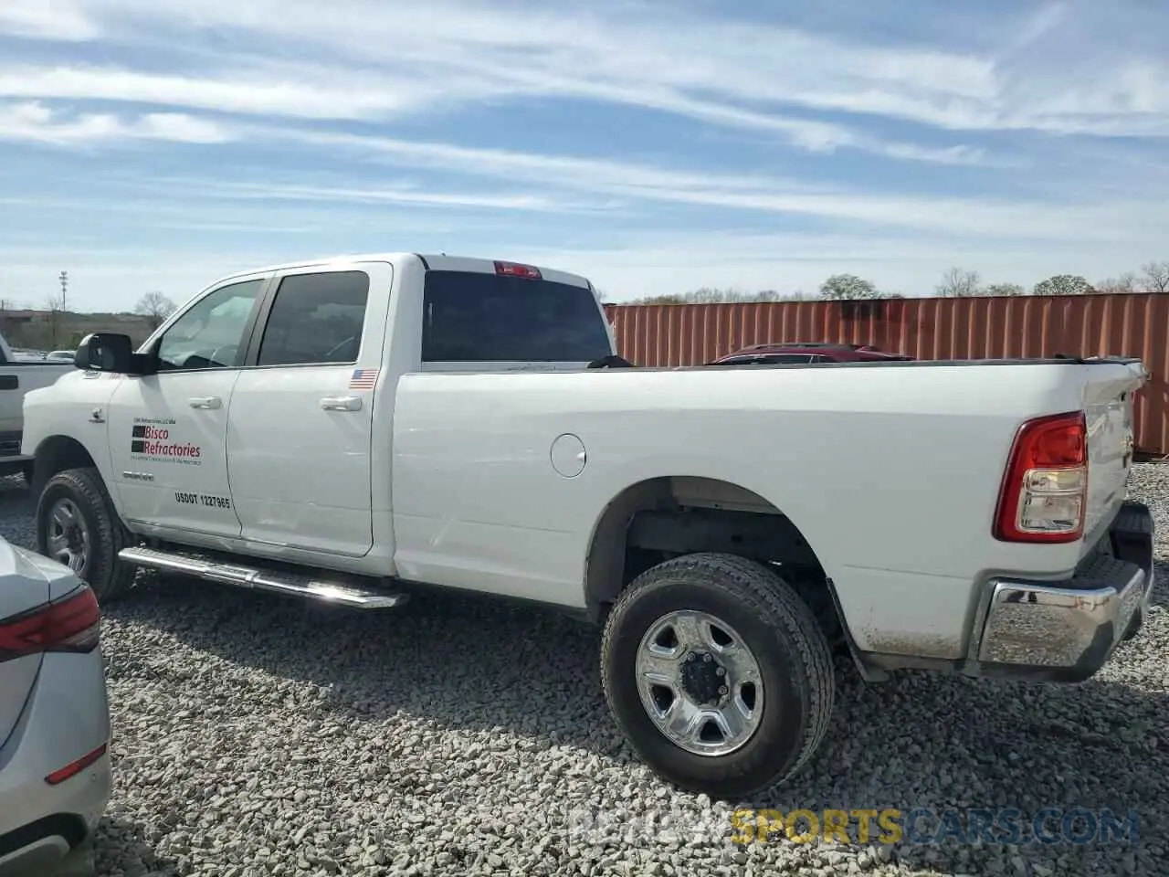 2 Photograph of a damaged car 3C6UR5JL1NG123958 RAM 2500 2022