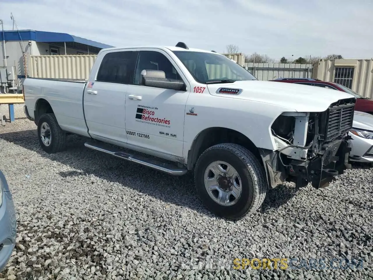 4 Photograph of a damaged car 3C6UR5JL1NG123958 RAM 2500 2022