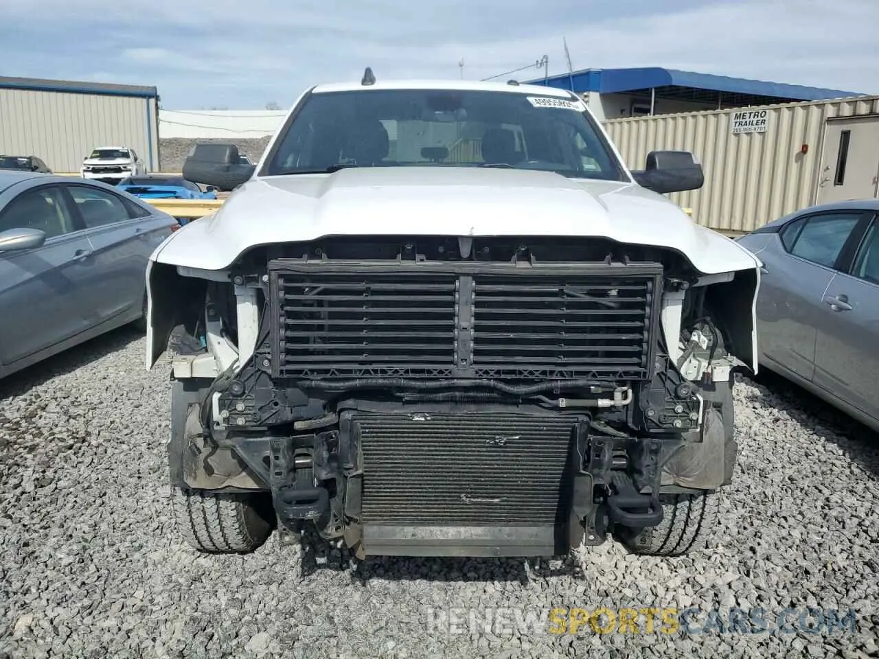 5 Photograph of a damaged car 3C6UR5JL1NG123958 RAM 2500 2022