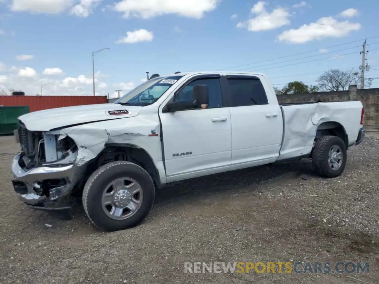 1 Photograph of a damaged car 3C6UR5JL3NG247441 RAM 2500 2022