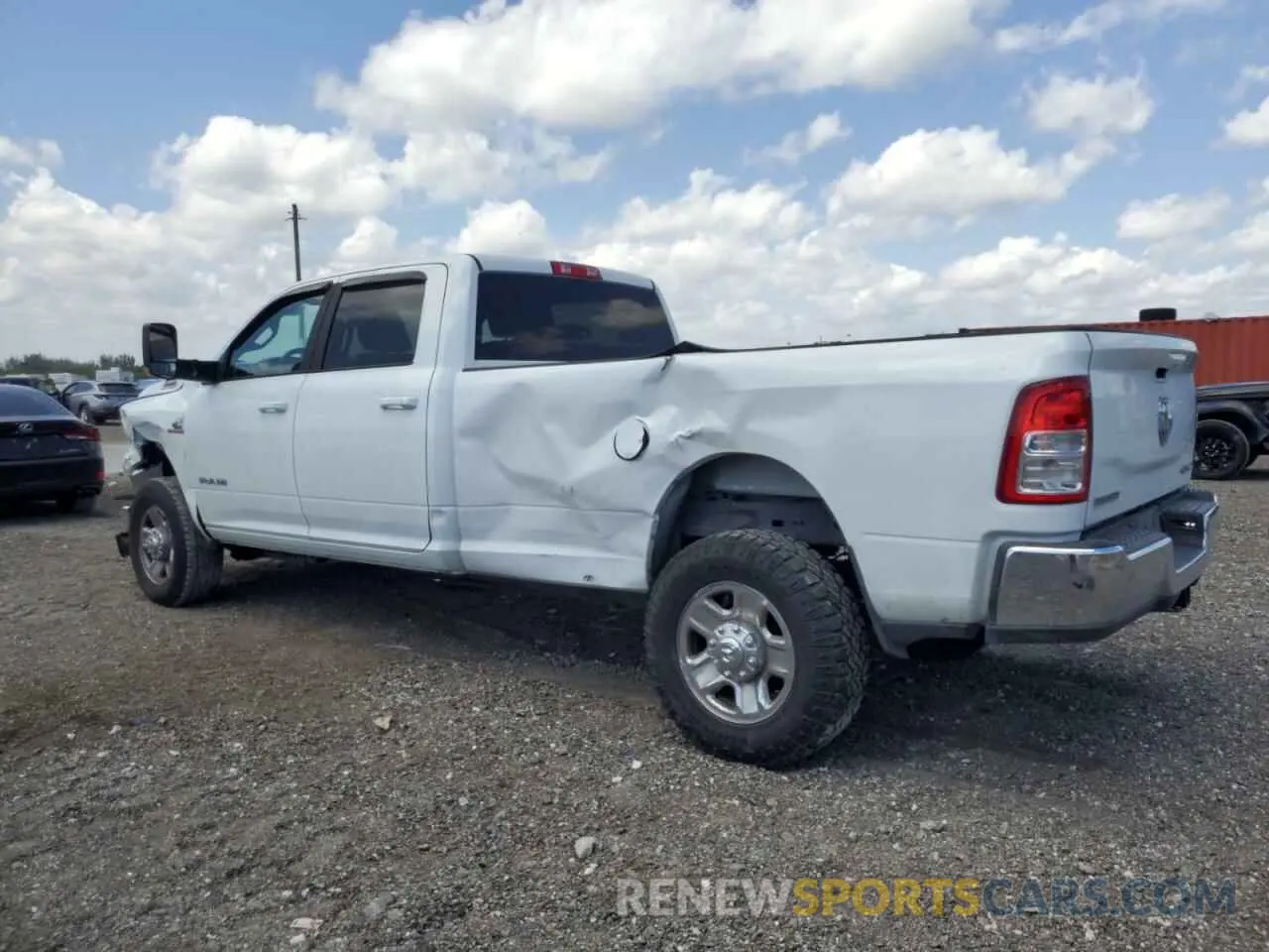 2 Photograph of a damaged car 3C6UR5JL3NG247441 RAM 2500 2022