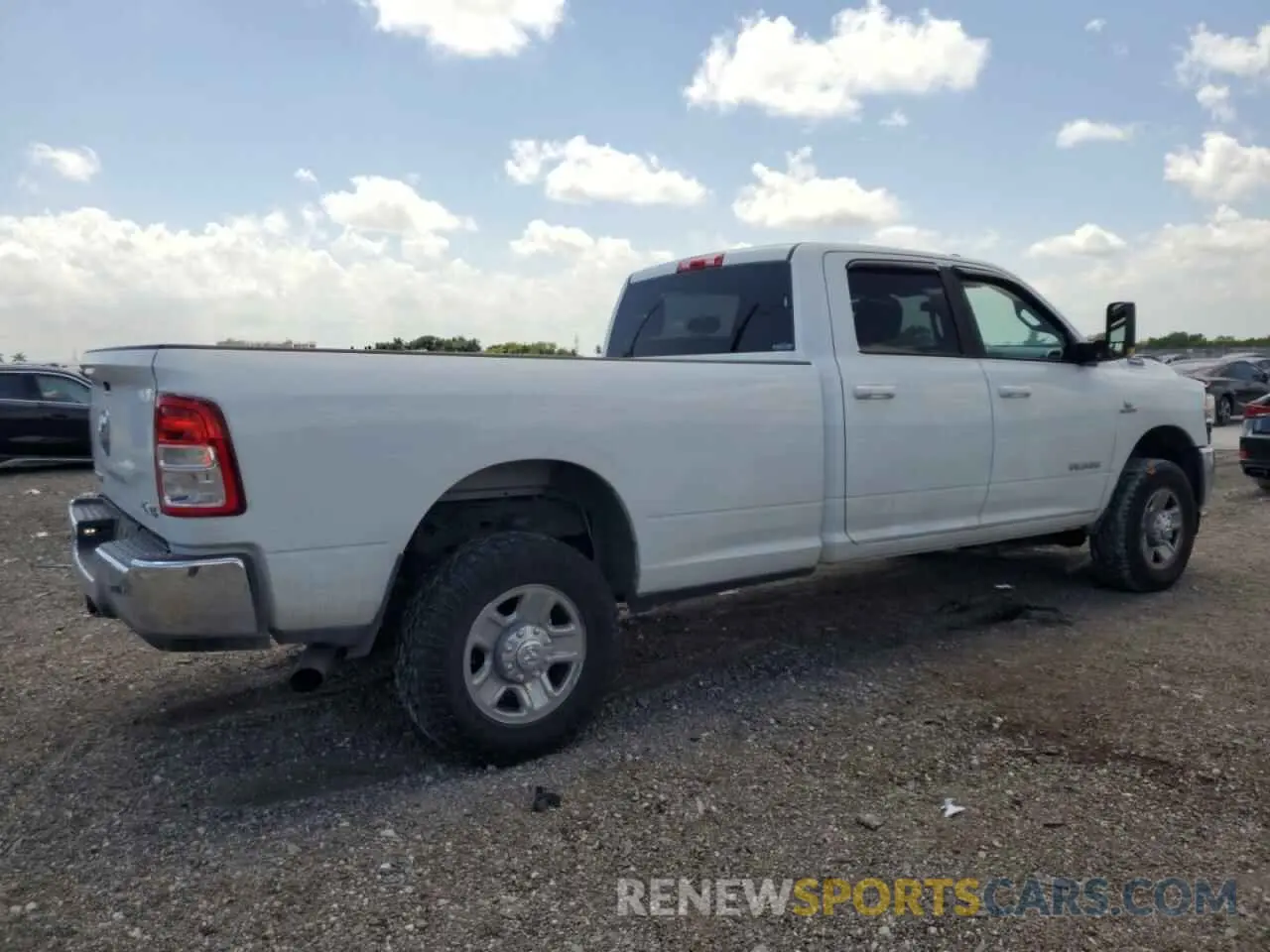 3 Photograph of a damaged car 3C6UR5JL3NG247441 RAM 2500 2022