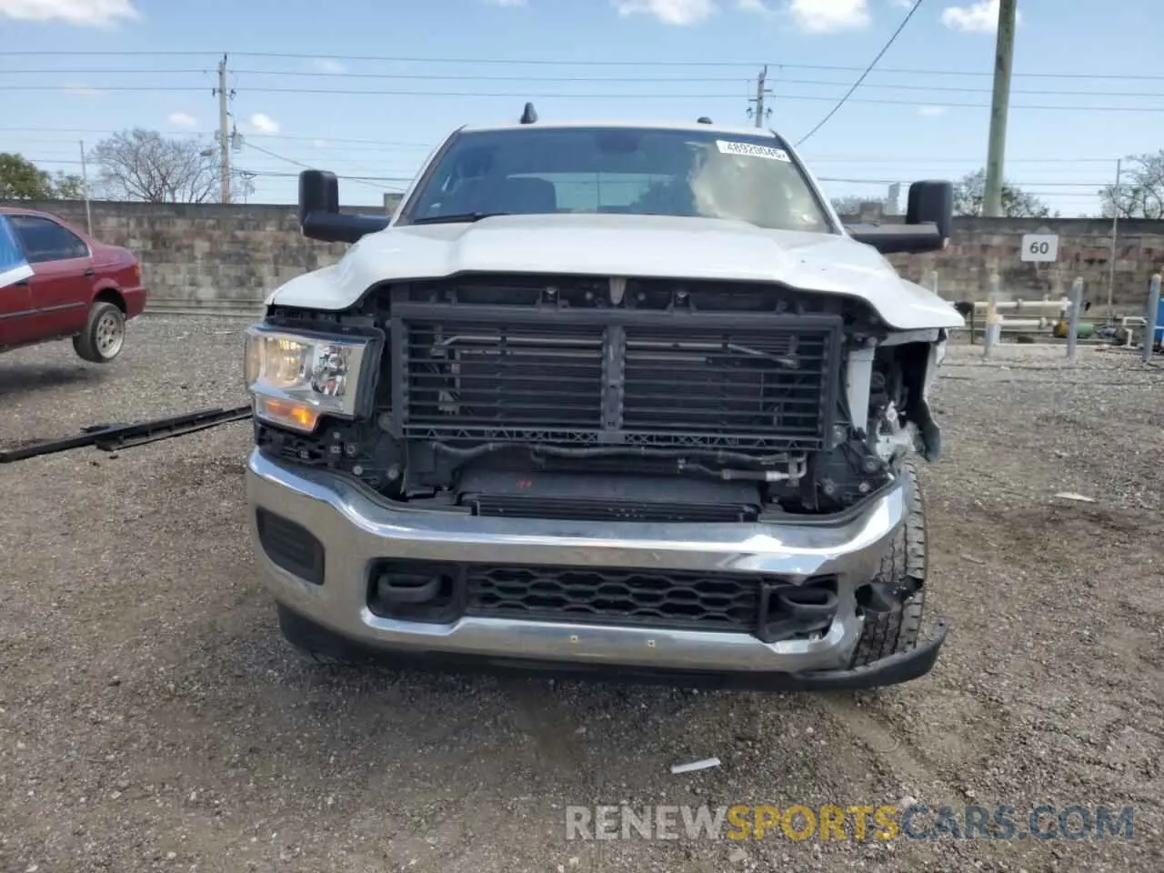 5 Photograph of a damaged car 3C6UR5JL3NG247441 RAM 2500 2022